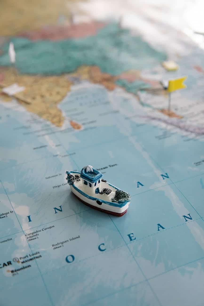 plastic ship toy on indian ocean map